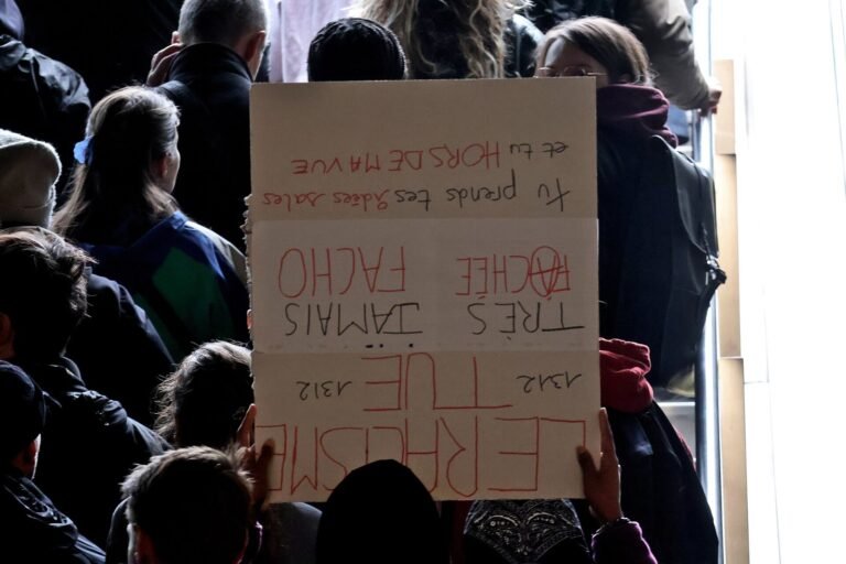 Protesters march in Paris on 24 October 2026.